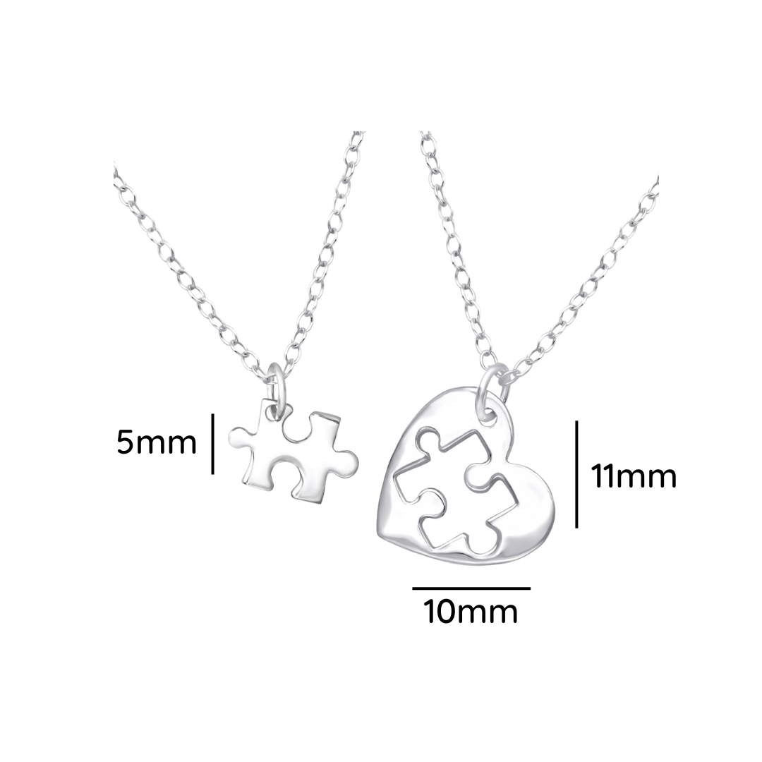 Heart puzzle sterling silver necklace pair shown with a size label on a white background