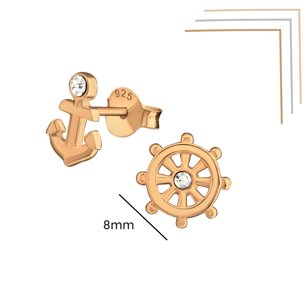 Anchor and wheel rose gold ear studs shown with a size label on a white background
