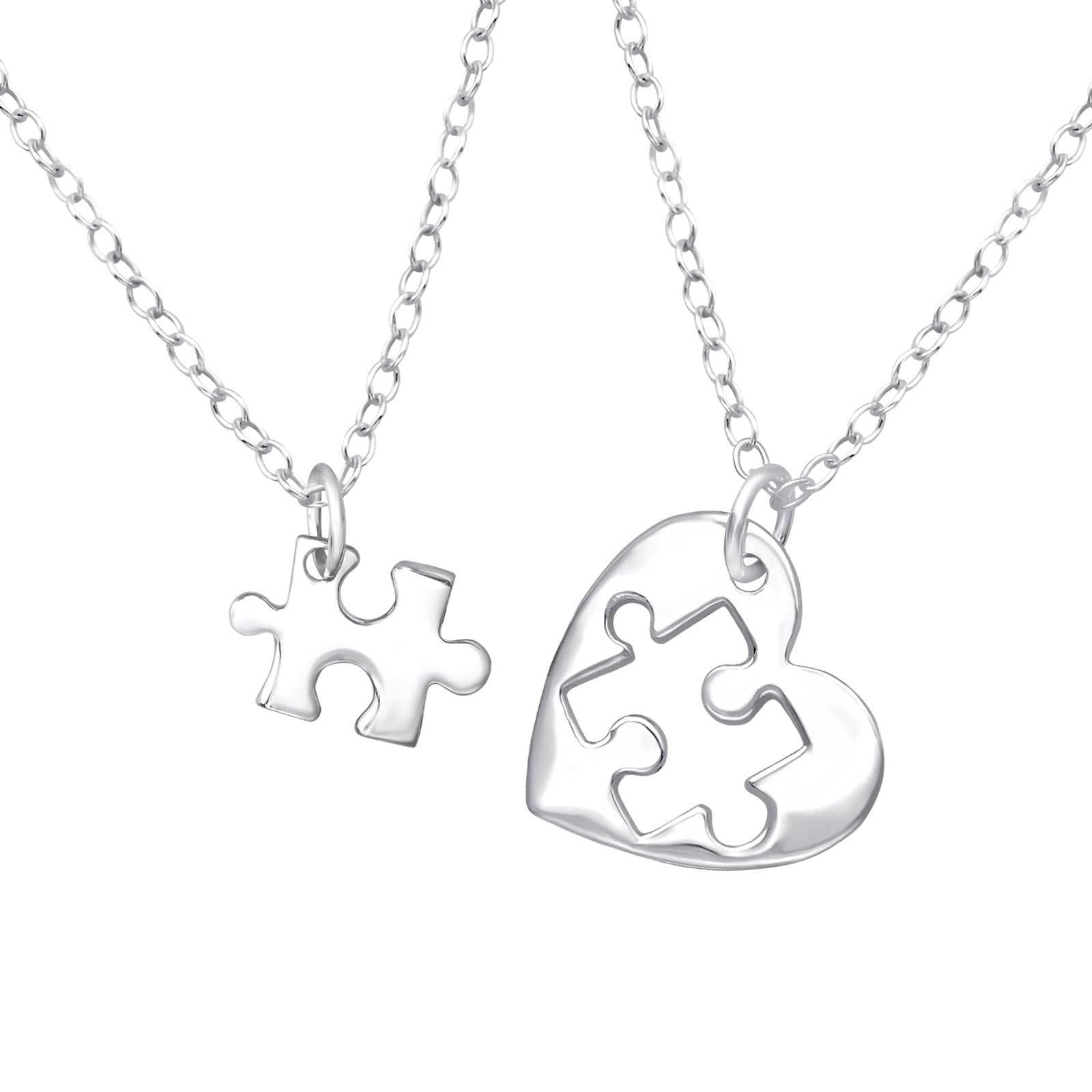 Heart puzzle sterling silver necklace pair on a white background