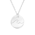 Silver necklace with a wave pendant on a white background