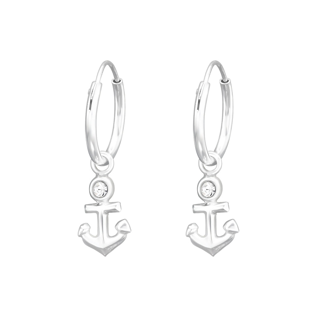 Hanging anchor sterling silver ear hoops with crystal on a white background