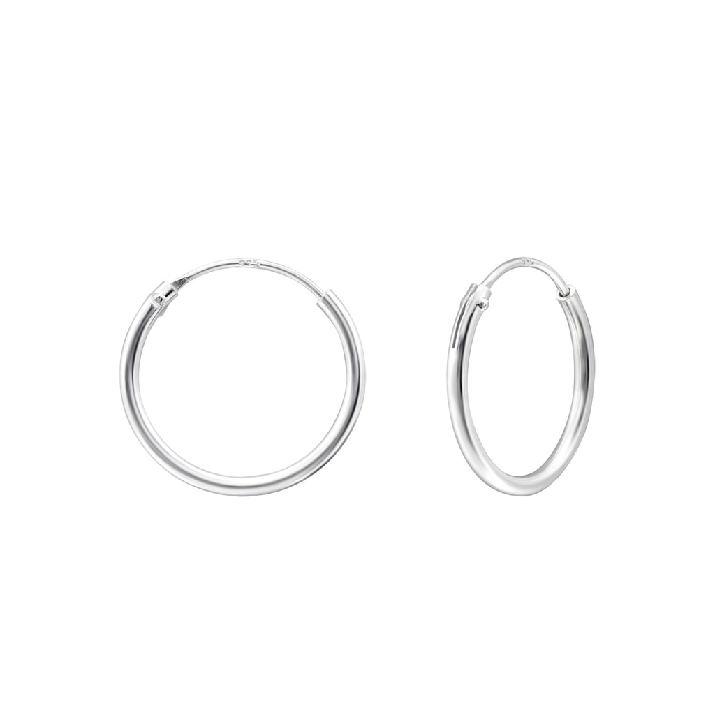 14mm sterling silver ear hoops on a white background