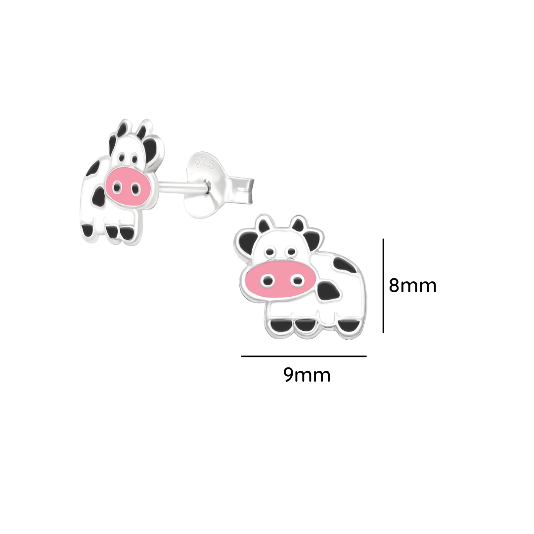 Cow sterling silver ear studs with epoxy shown from an alternate angle