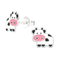 Cow sterling silver ear studs with epoxy on a white background
