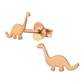 Dinosaur rose gold ear studs on a white background