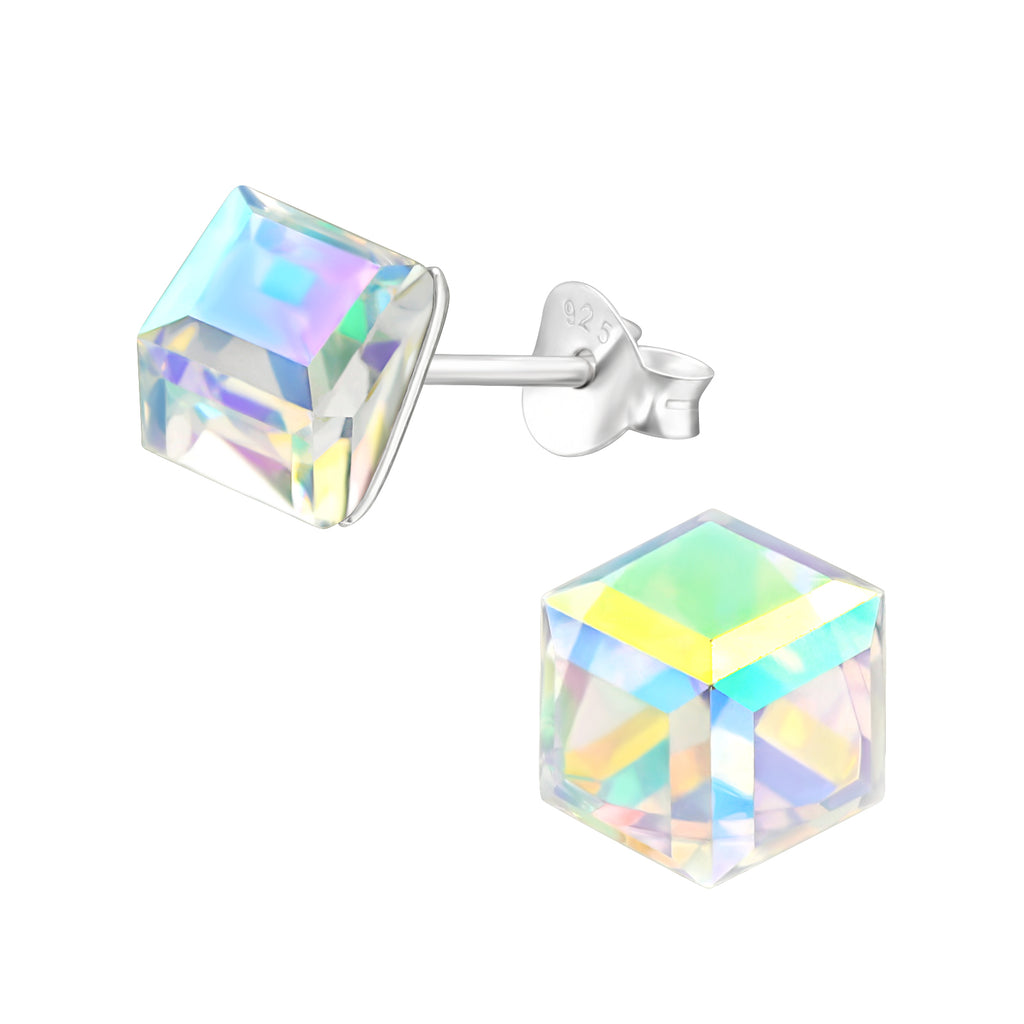 Cube sterling silver ear studs with crystal on a white background
