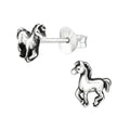 Horse sterling silver ear studs on a white background