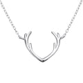 Antler sterling silver necklace on a white background